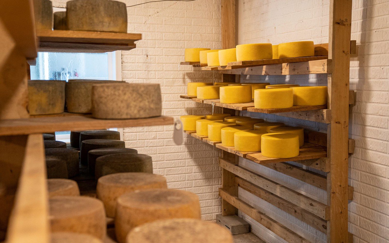 Beaufort-sur-Doron aging cellar wooden shelves wheels