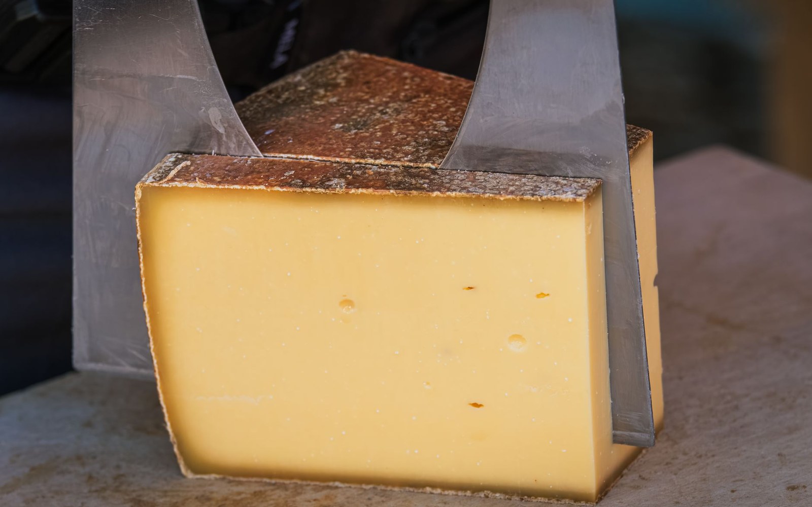 Cut cheese wheel grey rind board